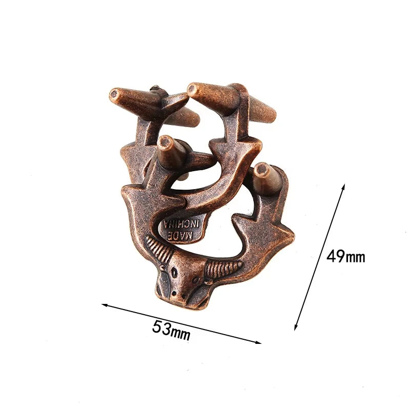 Bronze ship-shaped puzzle variant with 53mm by 49mm measurements on a white background.