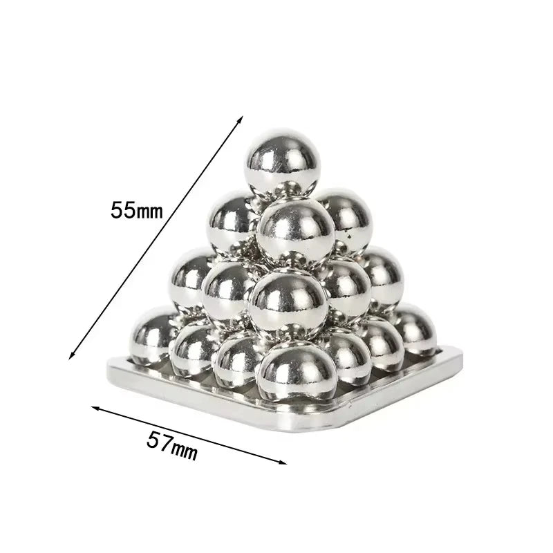 Metal pyramid stack of spheres puzzle variant with 55mm by 57mm dimensions labeled on a white background.