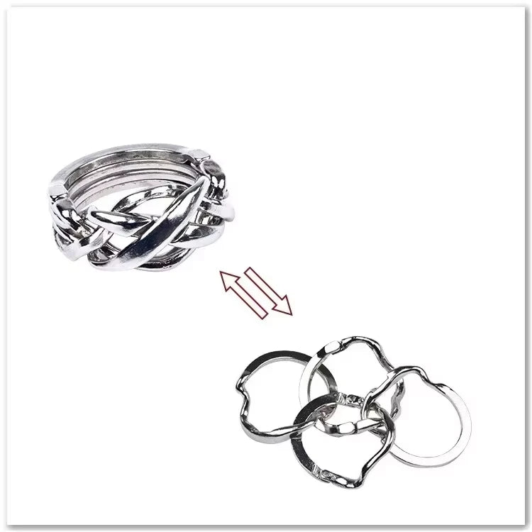 Silver ring puzzle variant with interlocking design on a white background
