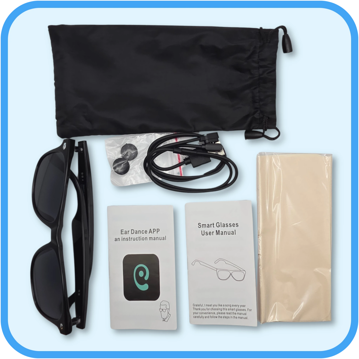 Smart glasses with USB cable, user manual, and drawstring bag on a light blue background
