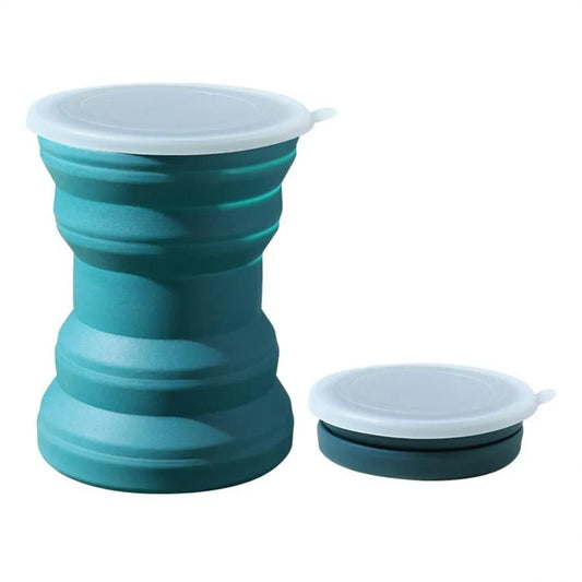 Blue collapsible cup with white lid on a white background
