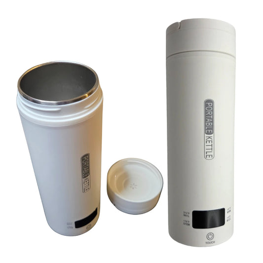 White electric heating thermos on a white background