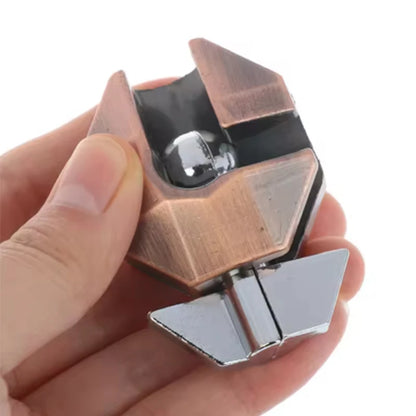 Hand holding the geometric metal lock puzzle on a white background.