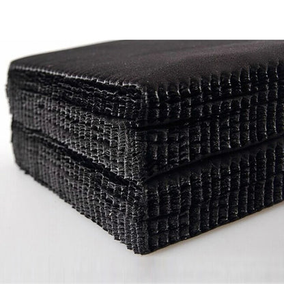 Stack of black glasses cleaning cloths on a white background