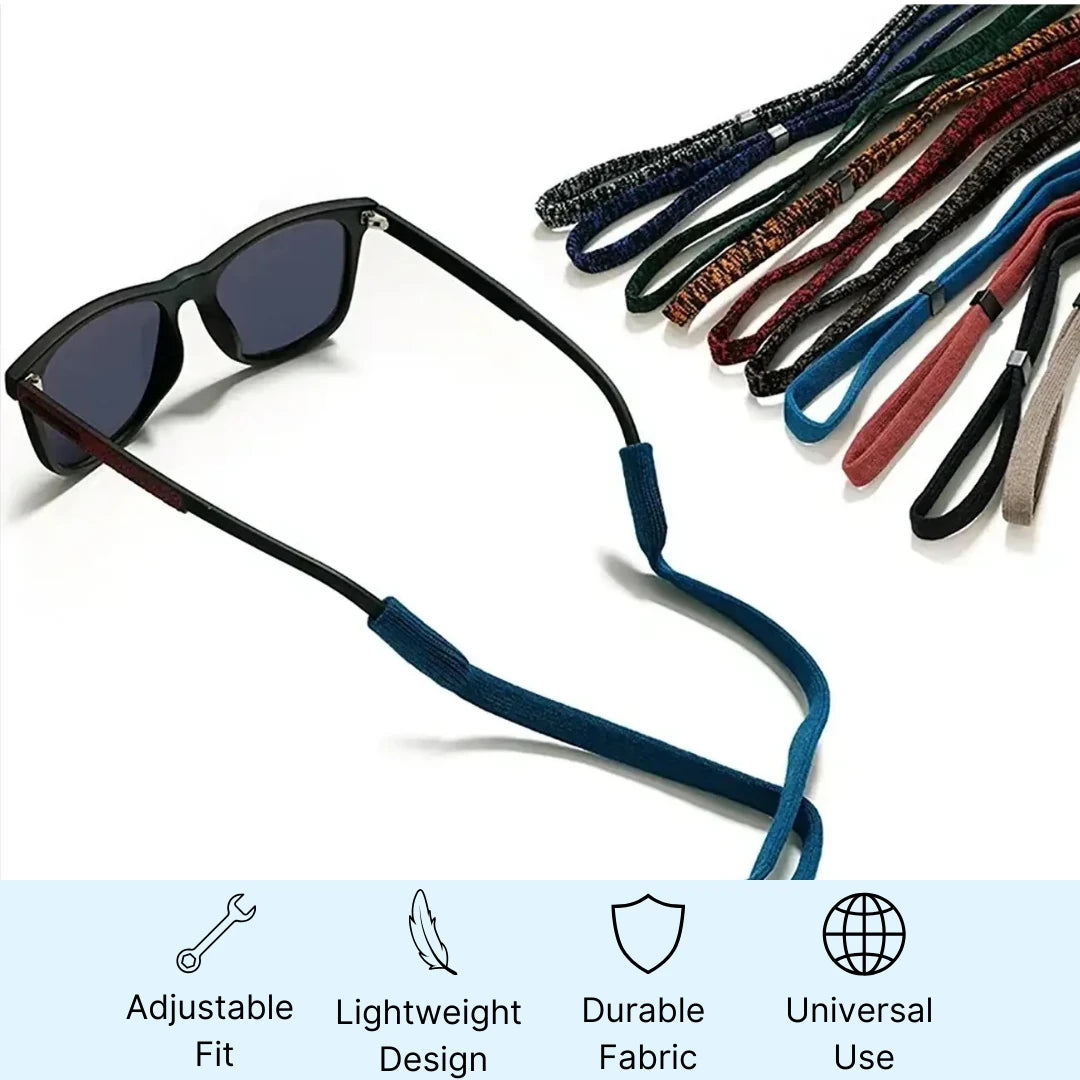 Sunglasses with a black neck strap and additional straps in various colors on a white background.