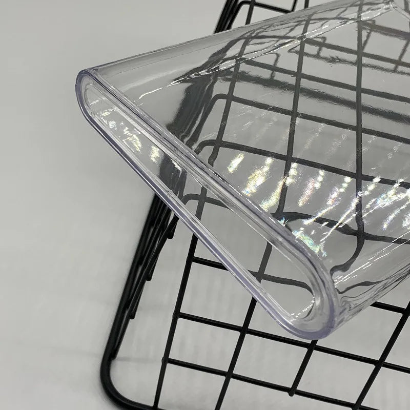 Clear plastic container on a black grid background