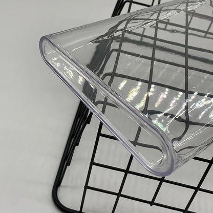 Clear plastic container on a black grid background