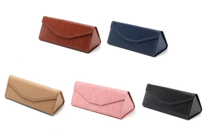 Collection of various colored triangular eyewear cases on a white background