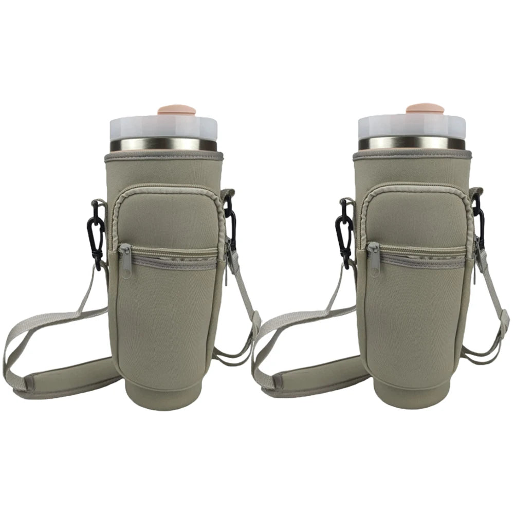 Two gray water bottle carrier pouches with straps on a white background