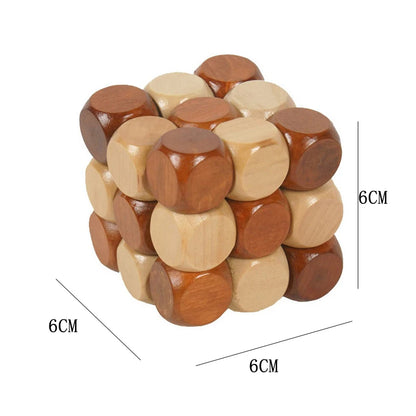 Wooden twist puzzle cube with dimensions labeled as 6cm by 6cm by 6cm on a white background.