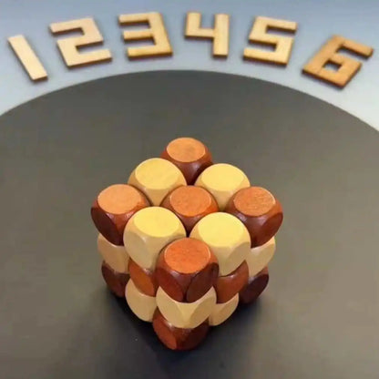 Wooden twisting cube puzzle in its cube shape on a dark background.